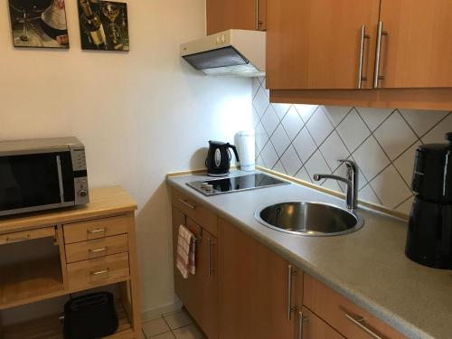 Η κουζίνα ή μικρή κουζίνα στο Steiner Strandappartements Appartement 201 Seeseite