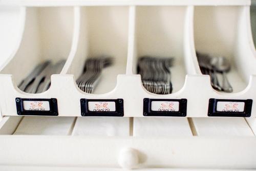 a close up of a keyboard with four forks at Domizil Gols, Studios Am Anger in Gols