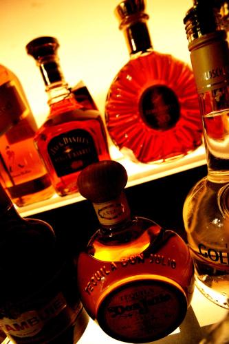 a group of bottles of alcohol on a table at Boutique 25 in Skipton