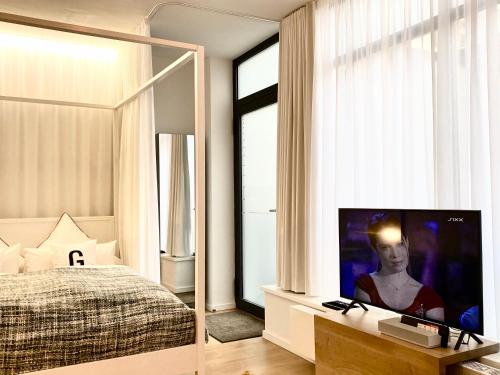 מיטה או מיטות בחדר ב-Grace-Design-Apartment - very central