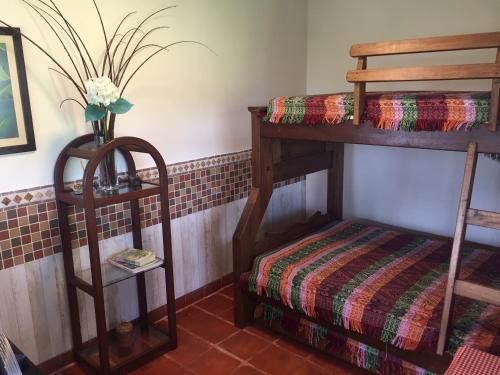 Кровать или кровати в номере Cabaña Campestre Las Palmas
