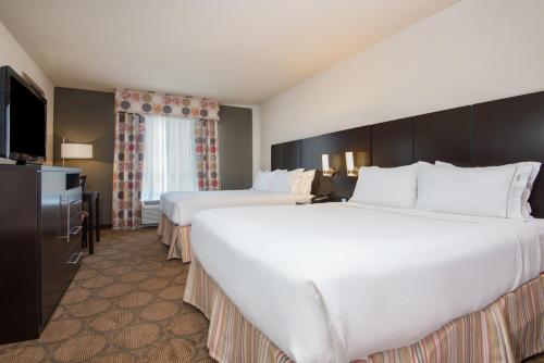 Ένα ή περισσότερα κρεβάτια σε δωμάτιο στο Holiday Inn Express Hotel & Suites Hobbs by IHG