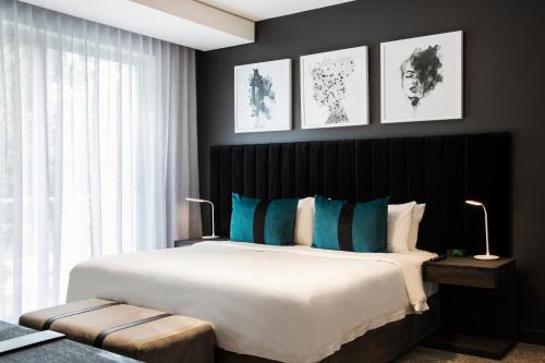 Letto o letti in una camera di The Capital Empire