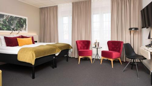 Ένα ή περισσότερα κρεβάτια σε δωμάτιο στο Best Western Hotel Svava