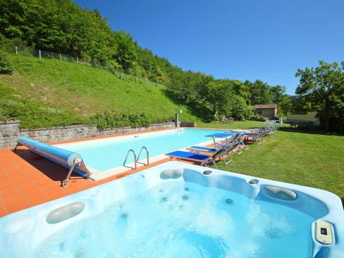 The swimming pool at or close to Apartment Piano Rosso 2 by Interhome