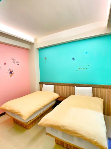 Ένα ή περισσότερα κρεβάτια σε δωμάτιο στο The Sunny Homestay
