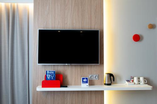 TV a/nebo společenská místnost v ubytování Holiday Inn Express - Bordeaux - Lormont by IHG
