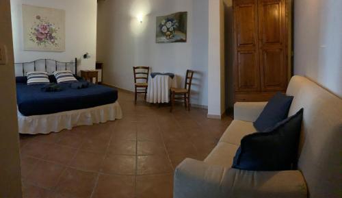 Postel nebo postele na pokoji v ubytování Agriturismomillefiori
