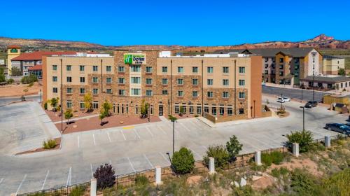 an empty parking lot in front of a building at Holiday Inn Express & Suites Gallup East by IHG in Gallup