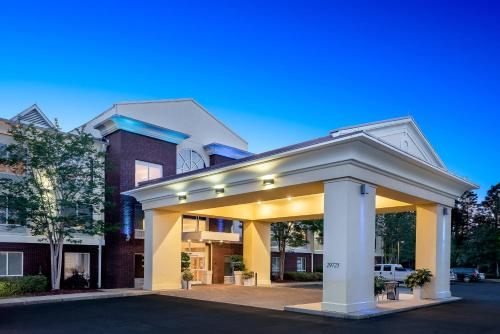 a building with a pavilion in front of it at Holiday Inn Express Daphne-Spanish Fort by IHG in Spanish Fort