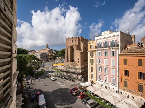 a view of a street in a city with buildings at Hotel Labelle in Rome