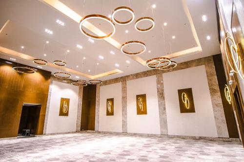 a large room with paintings on the walls at Hotel Lucky Chinatown Binondo Manila in Manila