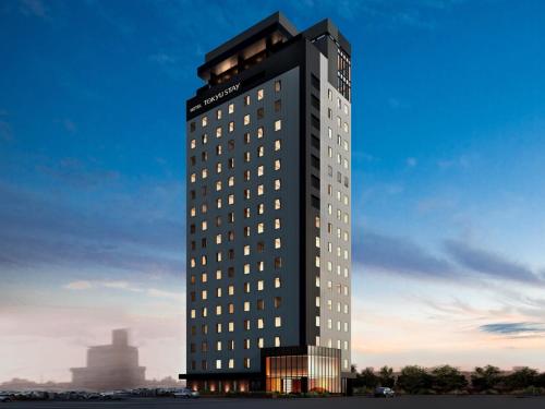 a tall building with a lot of windows on it at Tokyu Stay Hakodate Asaichi Akarinoyu in Hakodate
