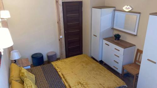 Cama o camas de una habitación en Vaļņu Ielas Apartments