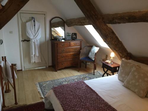 Postel nebo postele na pokoji v ubytování Pérard Chambres D’Hotes