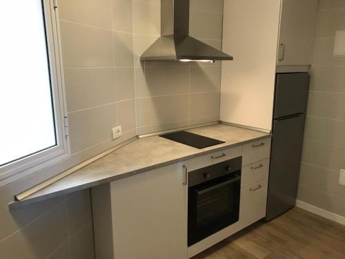 Dapur atau dapur kecil di Apartamentos Bruja