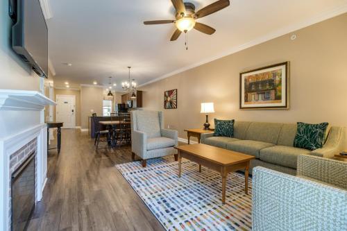 a living room with a couch and a fireplace at Holiday Inn Club Vacations Williamsburg Resort in Williamsburg