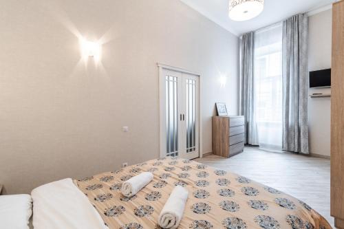 Krevet ili kreveti u jedinici u okviru objekta Nikolaj Kopernikus apartment