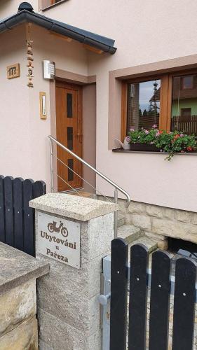 a house with a sign in front of it at U Pařeza in Ludvíkovice
