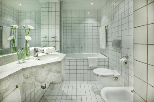 Een badkamer bij Messe Residence Boardinghouse