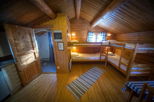 an overhead view of a cabin with two bunk beds at Ulvö Lakeside Resort in Ulvöhamn
