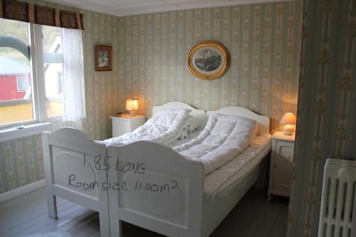 Postel nebo postele na pokoji v ubytování Cosy Guesthouse anno 1936