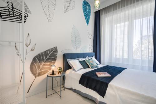 Posteľ alebo postele v izbe v ubytovaní BpR KYANIT Design Apartments with A/C