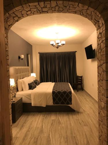 Suites Campestres Montebelloにあるベッド