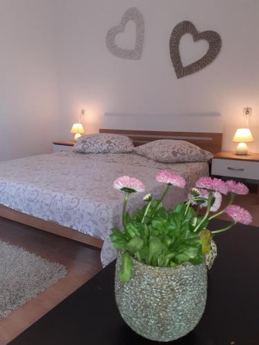 A bed or beds in a room at Apartments Balen