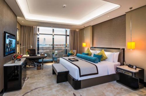 Télévision ou salle de divertissement dans l'établissement Narcissus Al Hamra Hotel Jeddah