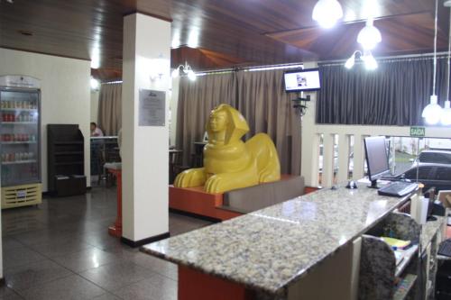 a yellow rubber duck sitting in a waiting room at Oasis Chartouni Hotel in Blumenau