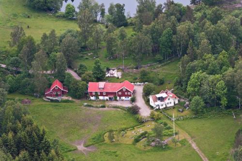 an aerial view of a house on a hill at Finas Torpgård B&K in Gällinge
