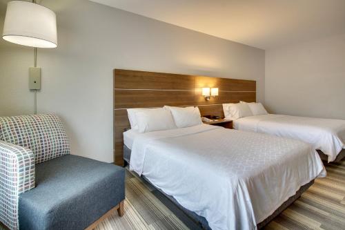 Katil atau katil-katil dalam bilik di Holiday Inn Express & Suites Laurel by IHG
