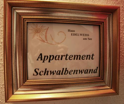 a picture of a sign in a frame on a wall at Edelweiss am See in Zell am See