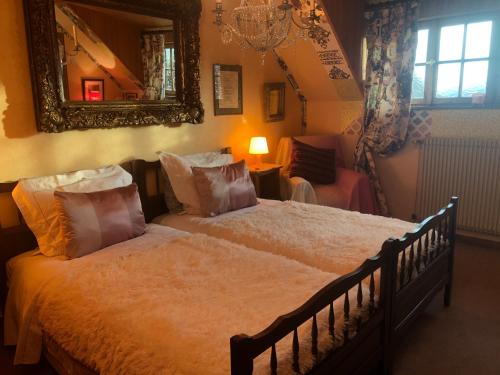 Кровать или кровати в номере La Maison de juliette
