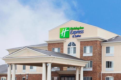 a building with a kings inn express and suites at Holiday Inn Express Hotel & Suites Mattoon by IHG in Mattoon