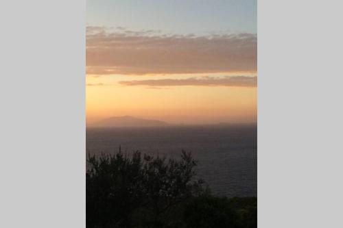 a view of the ocean at sunset at Casa Pierina in Anacapri
