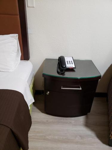 Postel nebo postele na pokoji v ubytování Value Inn & Suites Salina