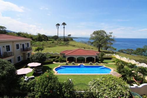 an aerial view of a house with a swimming pool at Star View Boutique Resort in Dumaguete