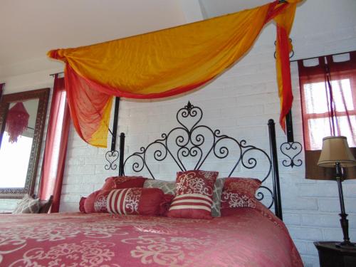 Ein Bett oder Betten in einem Zimmer der Unterkunft Poco Cielo Hotel