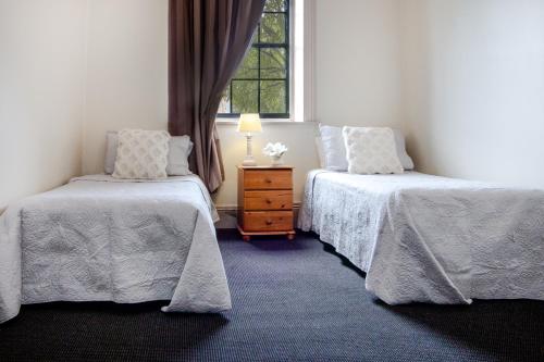 The Globe Hotel, Rylstoneにあるベッド