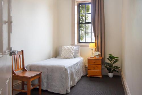 The Globe Hotel, Rylstoneにあるベッド
