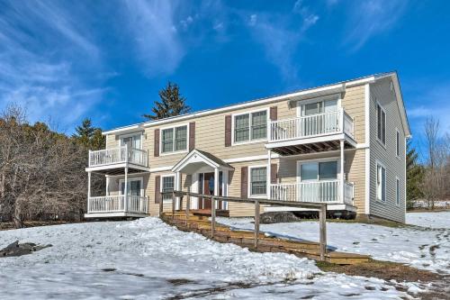 a large house with snow in front of it at Cozy Catskill Condo - 2 Mi to Windham Mountain Ski in Windham