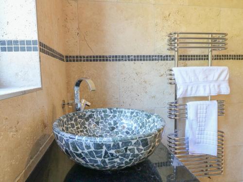 a bathroom with a large bowl sink in a bathroom at Manor House in Chesterfield