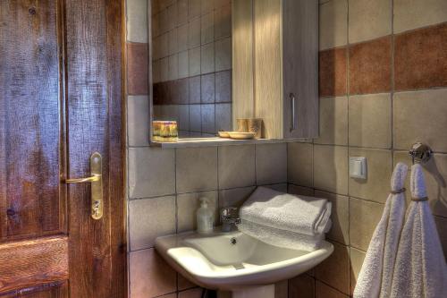 A bathroom at Toula Rooms