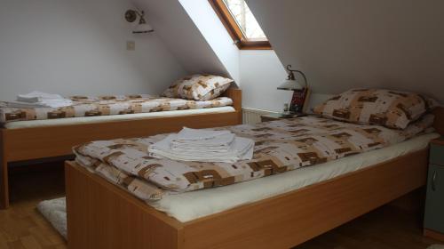 Postel nebo postele na pokoji v ubytování Fodor Ház