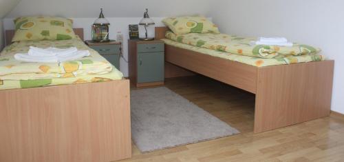 Postel nebo postele na pokoji v ubytování Fodor Ház