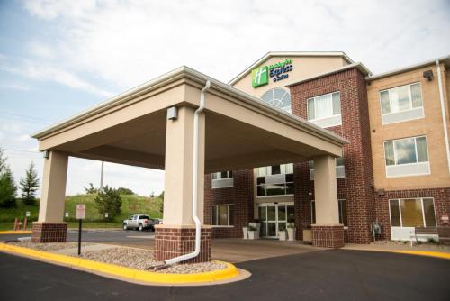 a building with a large cover in front of it at Holiday Inn Express Hotel & Suites Chanhassen by IHG in Chanhassen