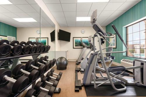 a fitness room with treadmills and weights at Holiday Inn Express Hotel & Suites Lawton-Fort Sill by IHG in Lawton