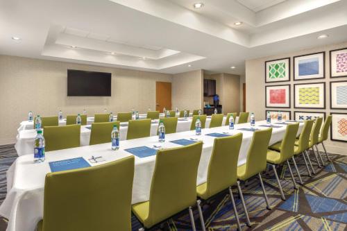 a conference room with a long table and chairs at Holiday Inn Express Hotel & Suites Lawton-Fort Sill by IHG in Lawton